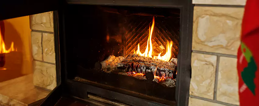 Commercial Prefabricated Fireplace Replacement in Saint Georges, Quebec